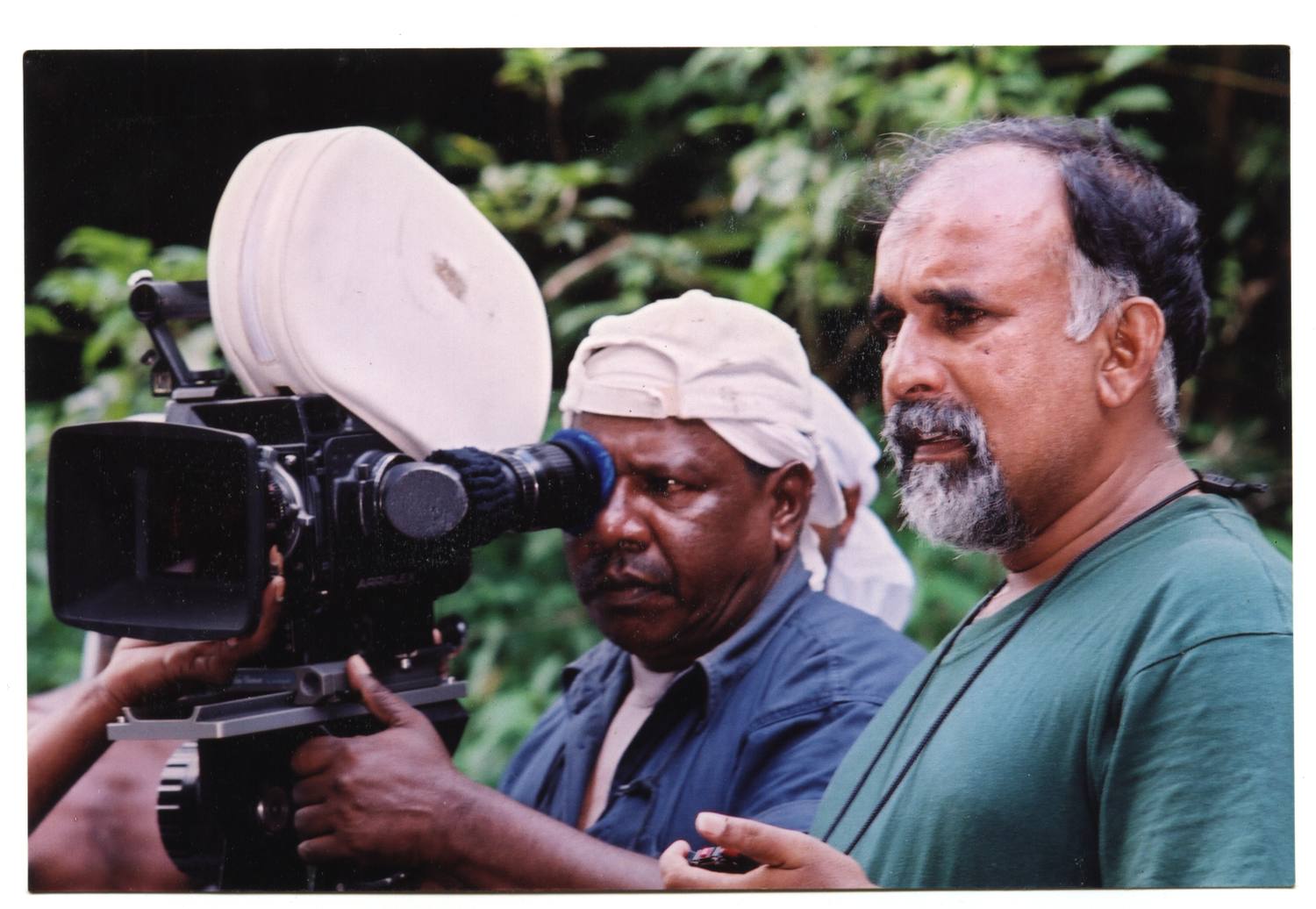 Sarath Dharmasiri beside the camera on location in the jungle